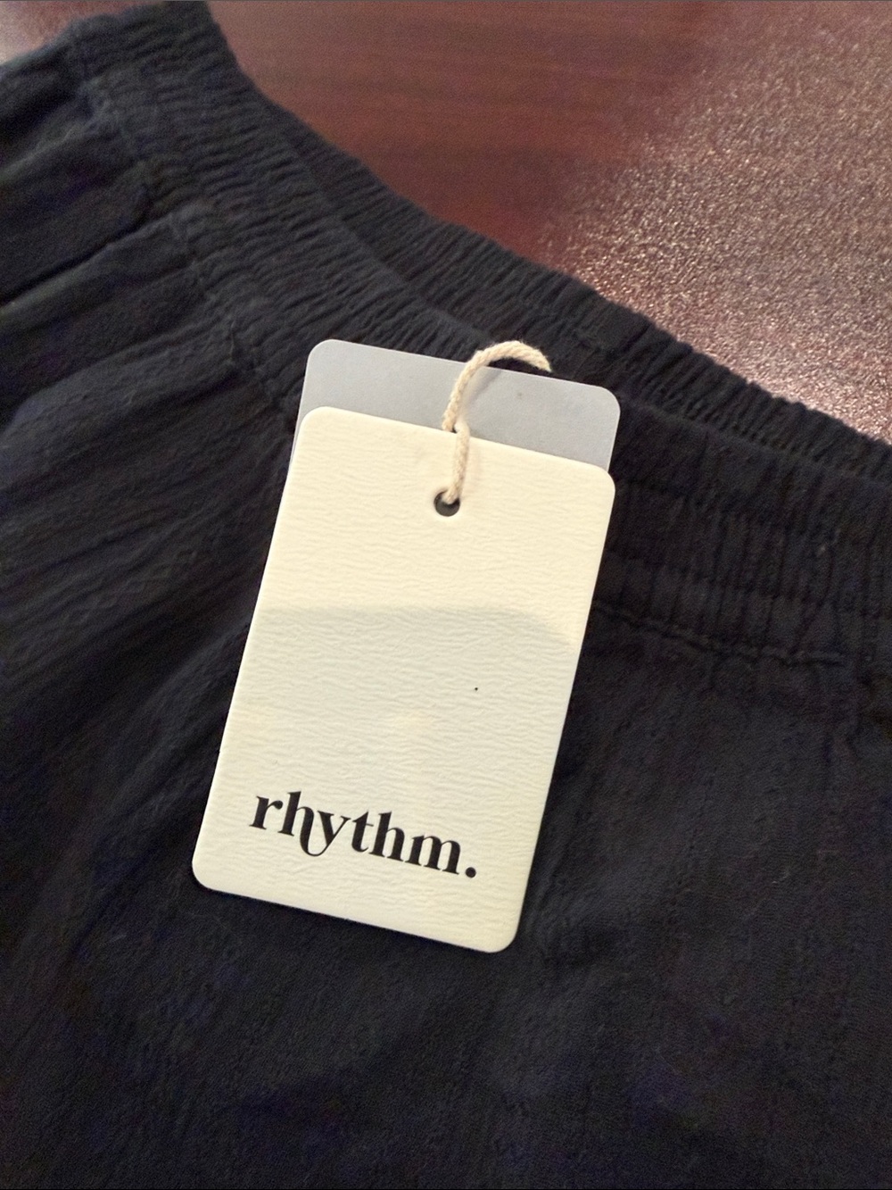 Rhythm. Black High-Waist Ruffle Hem Shorts - Picture 6 of 8